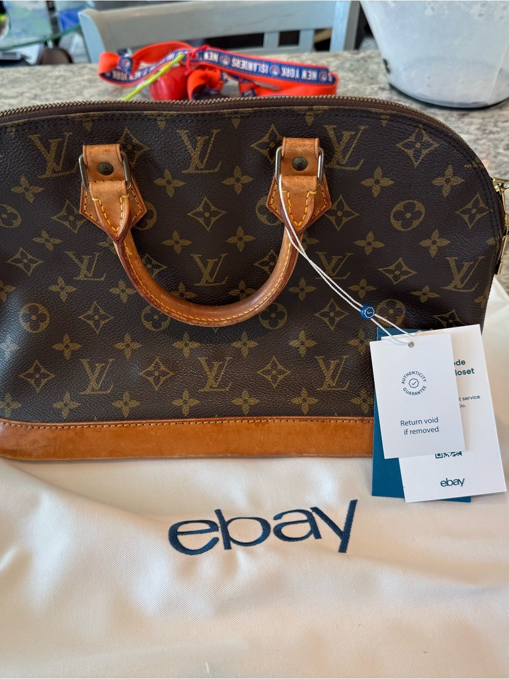 Louis Vuitton Monogram Alma Satchel - Brown and Tan Leather